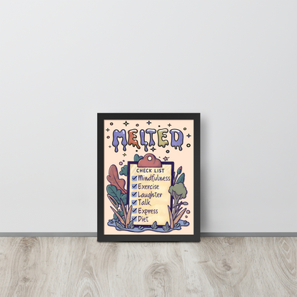 Framed illustrated poster with a black frame titled 'MELTED' featuring a checklist with items: Mindfulness, Exercise, Laughter, Talk, Express, Diet. The background includes whimsical abstract shapes and plants, and the poster is leaning against a white wall on a wooden floor.