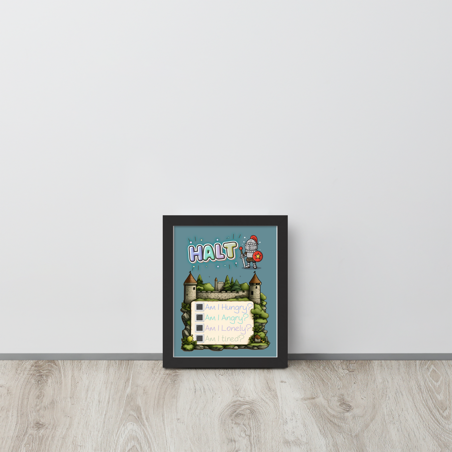 Framed illustrated poster leaning against a white wall on a wooden floor. The poster features the word 'HALT' at the top, a cute knight character, a castle background, and a checklist with 'Am I Hungry?', 'Am I Angry?', 'Am I Lonely?', 'Am I Tired?'.