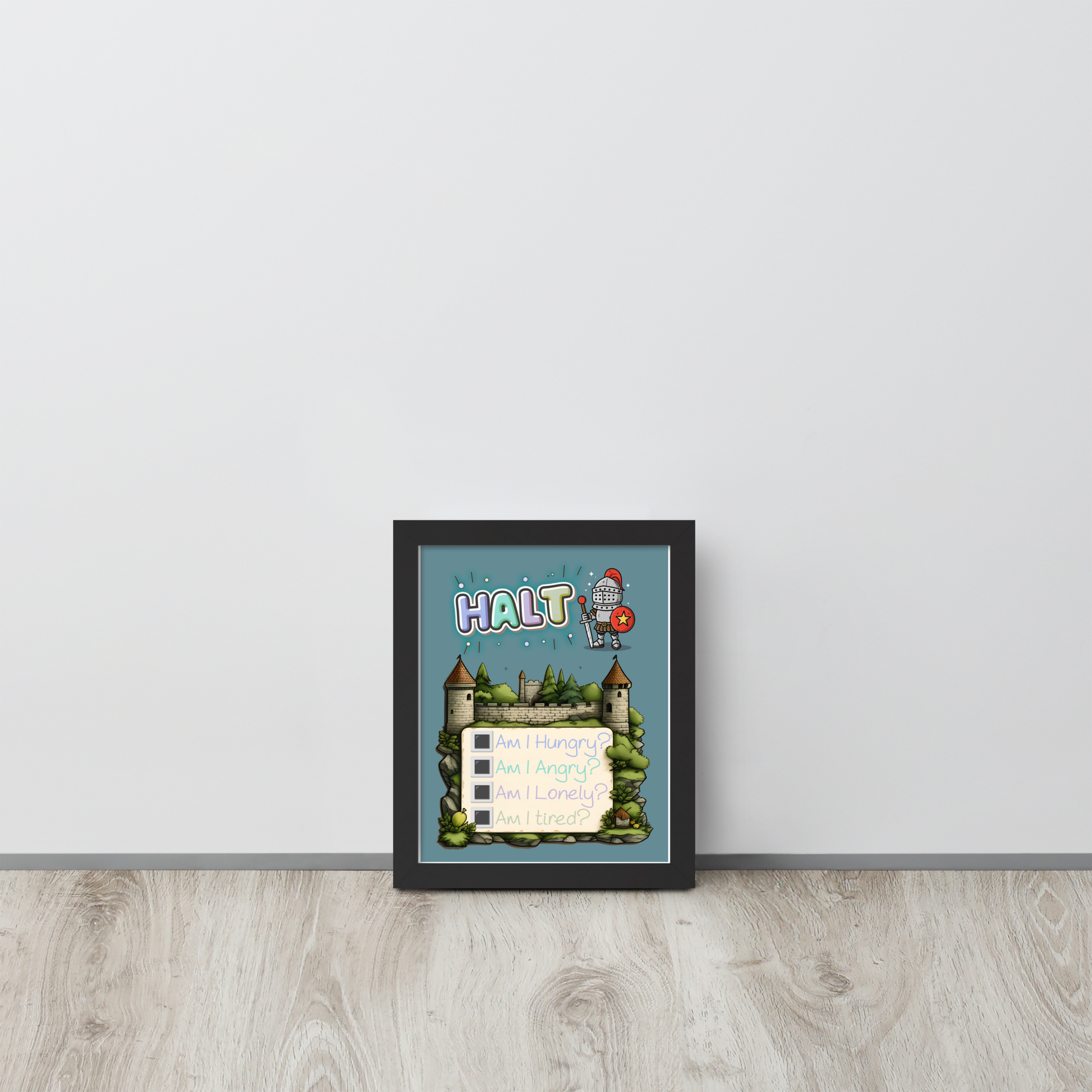 Framed illustrated poster leaning against a white wall on a wooden floor. The poster features the word 'HALT' at the top, a cute knight character, a castle background, and a checklist with 'Am I Hungry?', 'Am I Angry?', 'Am I Lonely?', 'Am I Tired?'.